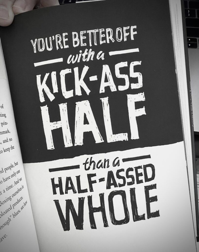 Book page that reads "You're better off with a kick-ass half than a half-assed whole."